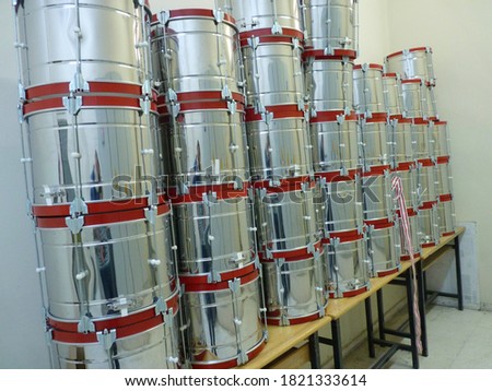 Lots of large metal drums