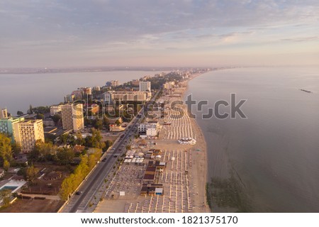  Summer sunrise over Mamaia coastline, at the Black Sea, Romania Royalty-Free Stock Photo #1821375170