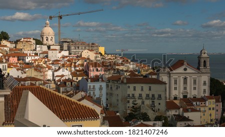 View from Miradouro do Recolhimento on the  beautiful view on rooftops of old part of Lisbon called Alfama. Autumn 2019.