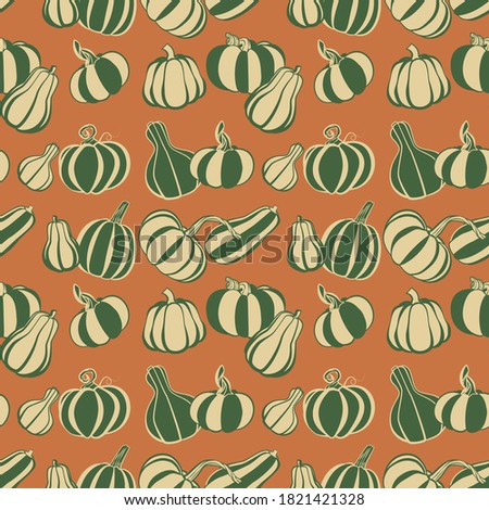 wallpaper of different kinds of pumpkins on an orange background for autumn