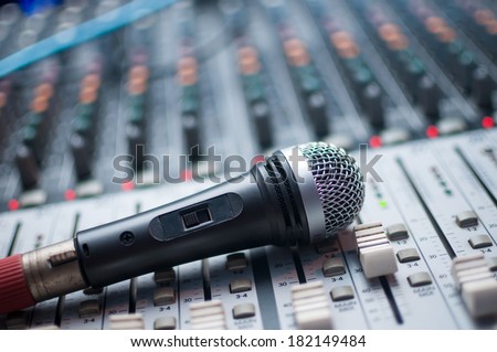 Microphone close-up on the sound mixer Royalty-Free Stock Photo #182149484