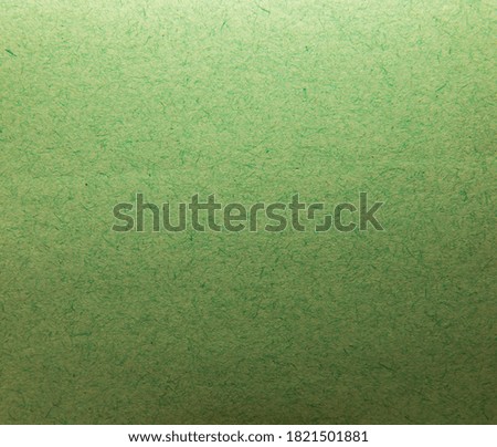 Texture of green stationery on macro photo