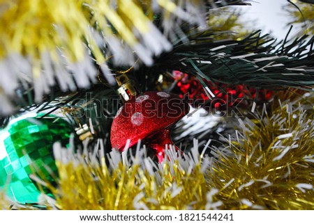 Beautiful Christmas background with a toy on the tree. 