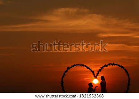 Man and Woman in Love with Sunset , Natural Picture.