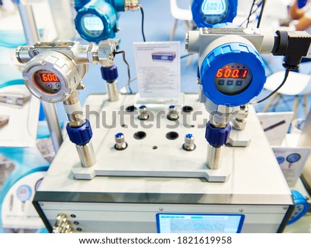 Automatic pressure calibrator at an industrial exhibition Royalty-Free Stock Photo #1821619958