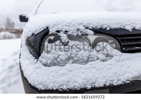 White snow on a car in winter.
