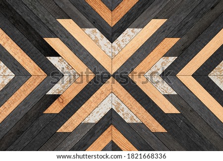 Old wooden planks texture. Dark  wooden panel with chevron pattern for wall decor. 