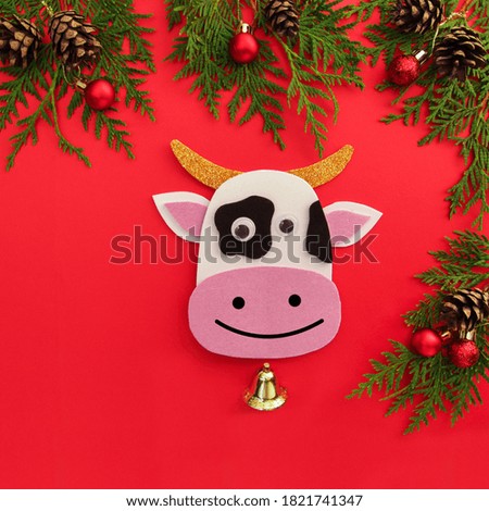 Craft kids Bull Chinese new year. 2021 year of the ox, Chinese zodiac symbol on red background. Copy space. square image