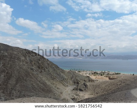 Israel's mountains and Jordan Mountains meeting at res sea in Eilat