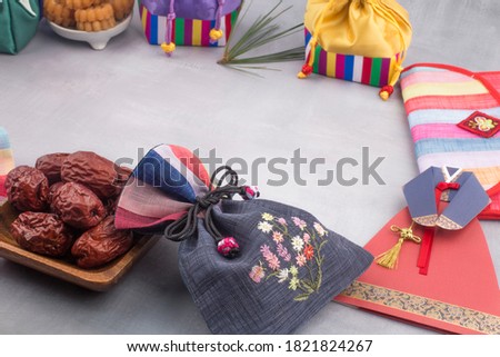 Korean traditional lucky bag and wrapping gift background. Royalty-Free Stock Photo #1821824267
