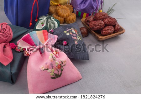 Korean traditional lucky bag and wrapping gift background. Royalty-Free Stock Photo #1821824276