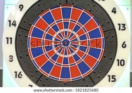 Dartboard, close up. Dart game. Target. Throwing darts. Target for darts game with score points around. Sport and recreation. 