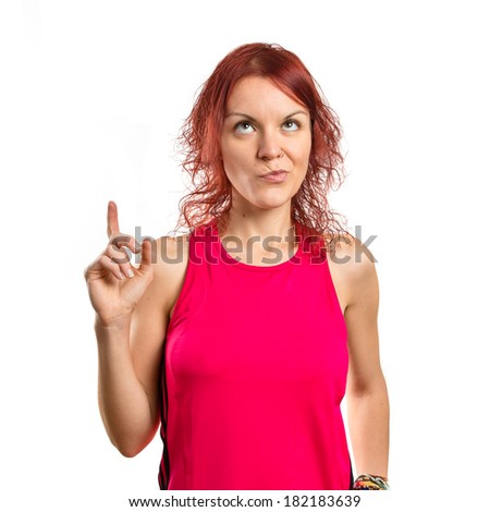 Young girl thinking over white background 