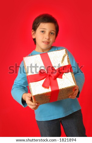 Cute boy with a christmas gift