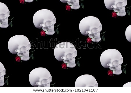 Skull pattern with rose flowers. Minimal romantic love concept. Halloween creative background.