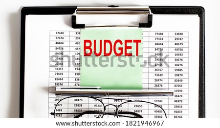Closeup of the deadline time of budget and glasses