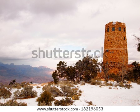 Desert view watchtower at Grand Canyon right before a snow storm arrives Royalty-Free Stock Photo #182196053