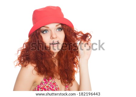 Beautiful thoughtful girl in red panama hat isolated on white.