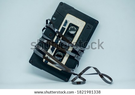 Vintage music cassette tape on white background  Royalty-Free Stock Photo #1821981338