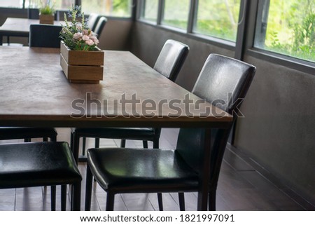 Conference table with chairs placed all around