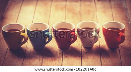 Group of a coffee cups. Photo in vintage color image style.