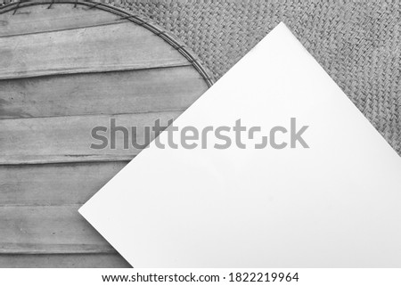 White paper background with copy space in black and white.