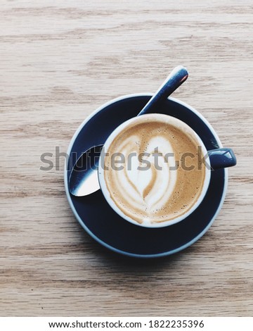 Aerial shot of an artful cup of coffee.