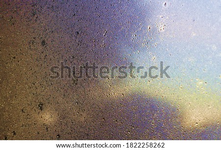 A photo of rain upon a window that has been specially edited to create beautiful and versatile texture backgrounds
