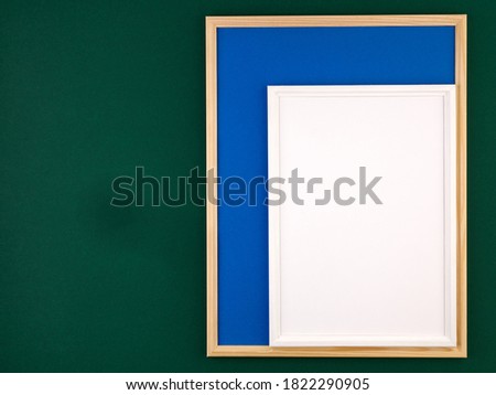 Images with space for text.Photo frame.Wooden frame.Frame.Board for recording.Colored background of geometric shapes.Color.