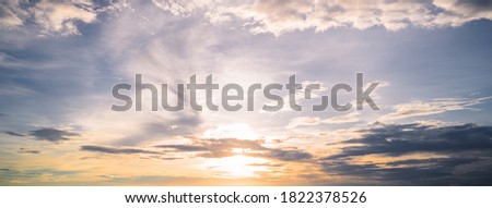 Sunset sky background with Clouds,Cover banner nature concept,Landscape of Sunset twilight over the sea in Thailand.