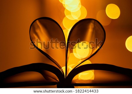 Book bokeh with a heart shape