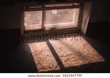 Sunlight Falling In Darkroom Through Window