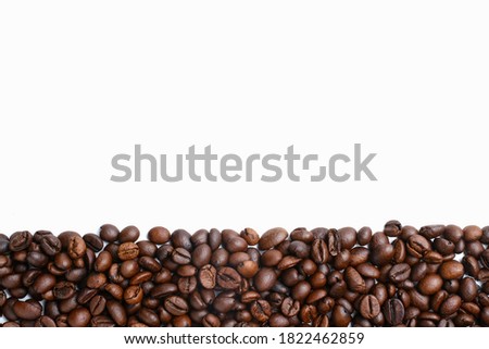 fresh coffee beans on wide white background