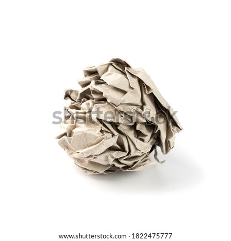 Wrinkled Kraft Paper Textured Ball Isolated on White background. Natural Brown Scrunched Vintage Paper Top View. Old Crumpled Wrapping
