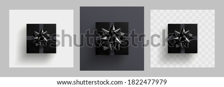 Decorative black gift box with glittering black bow and grey ribbons isolated on white, gray and transparent. 3d Vector realistic festive illustration. Decoration element for holiday design. Top view