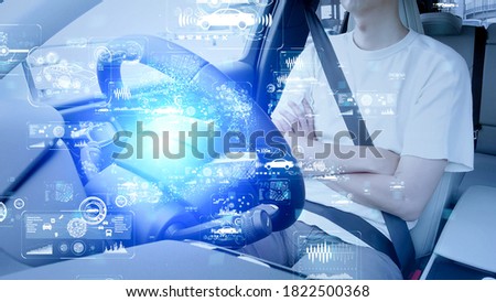 Driving an autonomous car. Adaptive cruise control. ITS (Intelligent Transport Systems). Mobility as a service. Royalty-Free Stock Photo #1822500368