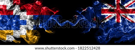 Nagorno-Karabakh, Artsakh vs New Zealand, New Zealander smoky mystic flags placed side by side. Thick colored silky abstract smoke flags