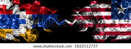 Nagorno-Karabakh, Artsakh vs Liberia, Liberian smoky mystic flags placed side by side. Thick colored silky abstract smoke flags