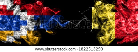 Nagorno-Karabakh, Artsakh vs Belgium, Belgian smoky mystic flags placed side by side. Thick colored silky abstract smoke flags