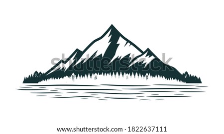 Mountain silhouette and coniferous forest near mountain lake or river