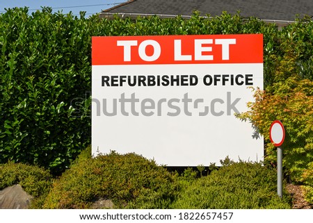 Sign advertising an empty office building available to let. No people, Copy space.