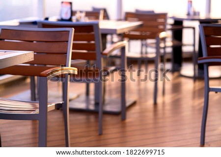 wooden chair cafe restaurant wooden deck Balconies on a back of Cruise ship