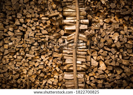 background with small, brown firewood. dark vignetting