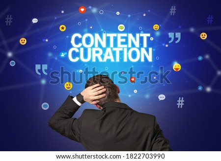 Rear view of a businessman with CONTENT CURATION inscription, social networking concept