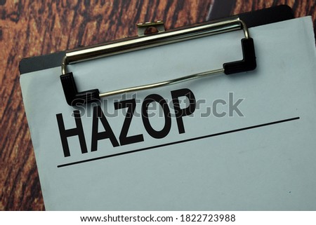 Hazop write on a paperwork isolated on office desk. Royalty-Free Stock Photo #1822723988