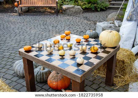 Pumpkins for autumn day decoration on the table.  