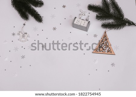flatley Christmas layout on December 31 with spruce branches wooden Christmas tree snowflakes