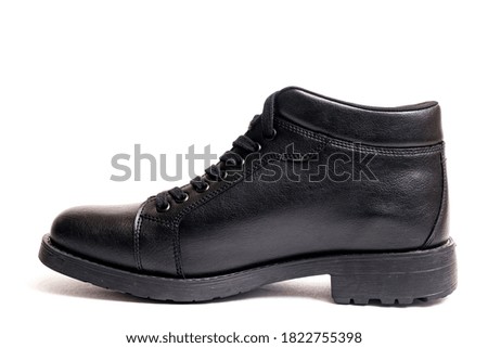 Black leather mens boots isolated on white background