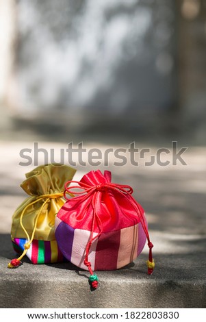 Korean traditional lucky bag. korean wrapping cloth pouch. Royalty-Free Stock Photo #1822803830