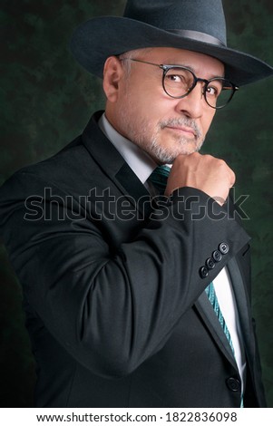 Adult hispanic man posing in executive photo session